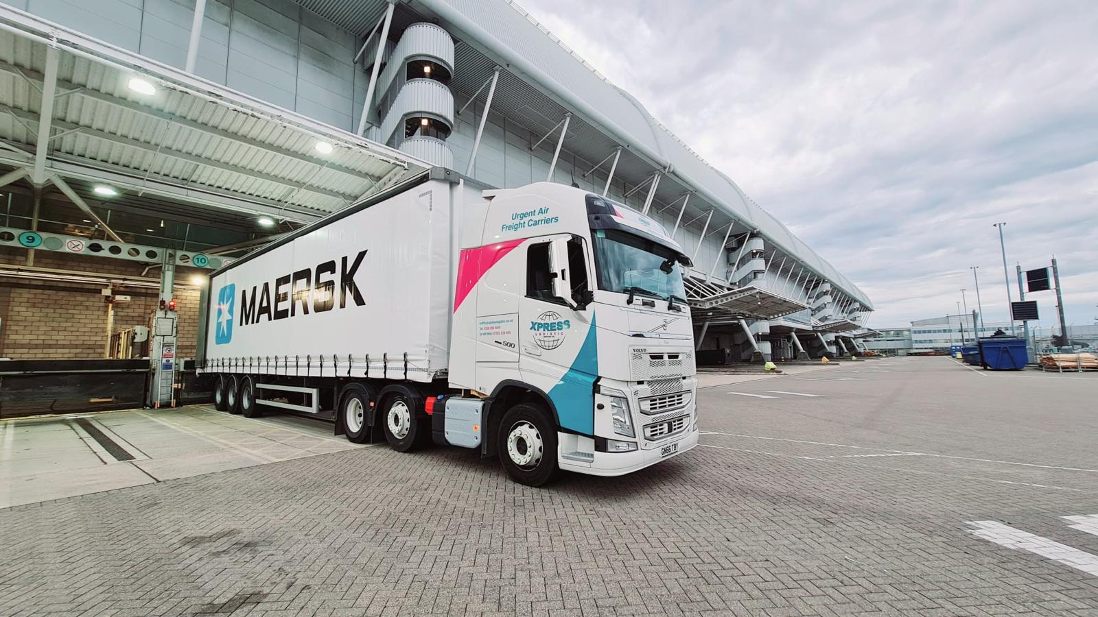 Xpress vehicle working at an airport cargo terminal